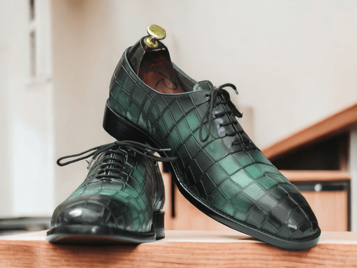 Expertly crafted, these Men's Handmade Alligator Print Sea Green Leather Shoes combine style and comfort. Made with high-quality leather, the alligator print adds a unique touch. With a sleek sea green color, elevate your footwear game with these stylish and durable shoes.