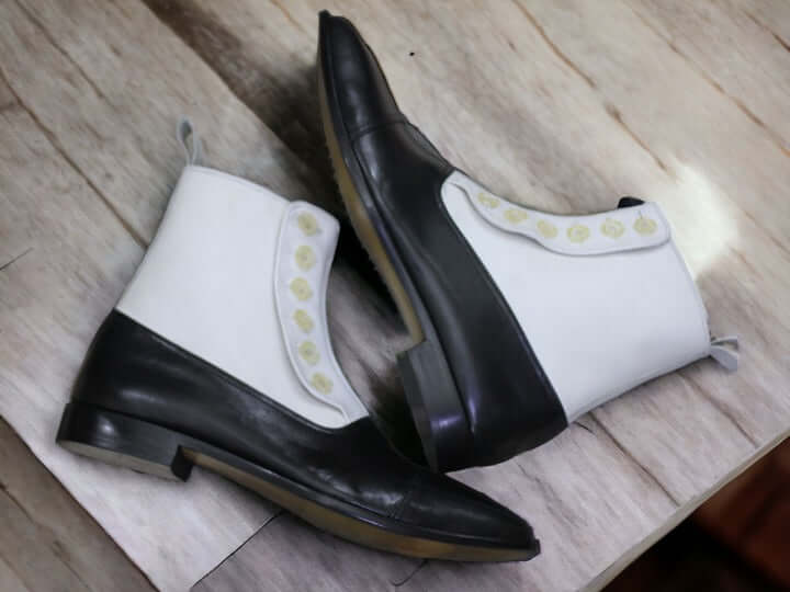 Take your style to the next level with these handmade men's button boots. Featuring a rich white and black design, they offer a timeless look and superior quality. Crafted from the finest materials, these boots will add classic style to any wardrobe.