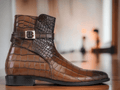 Expertly crafted from high-quality leather, these Handmade Alligator Print Jodhpurs Mustard Burnish Toe Ankle Boots provide durable, stylish footwear for men. Each pair is handmade for a unique touch and features a striking alligator print and burnished toe for a sophisticated look. Elevate your shoe game with these must-have boots.