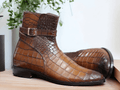 Expertly crafted from high-quality leather, these Handmade Alligator Print Jodhpurs Mustard Burnish Toe Ankle Boots provide durable, stylish footwear for men. Each pair is handmade for a unique touch and features a striking alligator print and burnished toe for a sophisticated look. Elevate your shoe game with these must-have boots.