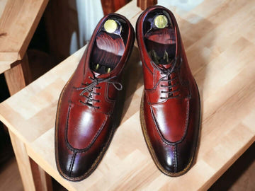 These handmade leather shoes feature a split toe design crafted from timeless burgundy leather. The craftsmanship is of the highest quality ensuring superior comfort and longevity.