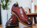 These handmade leather shoes feature a split toe design crafted from timeless burgundy leather. The craftsmanship is of the highest quality ensuring superior comfort and longevity.