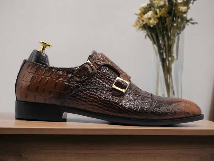 These handmade men's monk style Crocodile shoes are the perfect blend of comfort and style. Crafted with genuine crocodile leather, they are designed to be lightweight and durable for everyday wear. The unique monk style buckle closure ensures a secure fit every time. For a timeless look, opt for these classic handmade shoes.