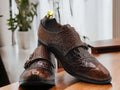 These handmade men's monk style Crocodile shoes are the perfect blend of comfort and style. Crafted with genuine crocodile leather, they are designed to be lightweight and durable for everyday wear. The unique monk style buckle closure ensures a secure fit every time. For a timeless look, opt for these classic handmade shoes.