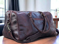 This full grain leather duffel bag is perfect for your next weekend getaway or vacation. Handmade with the highest quality leather, it offers durability and style. Its spacious design and sturdy construction make it the best gift for men and groomsmen. Upgrade your travel game with this luxurious weekender bag.