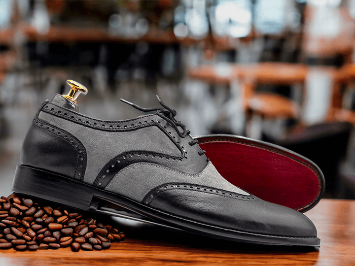 These handmade Wingtip Oxford Shoes are perfect for any special occasion. Crafted from premium materials, they offer a comfortable fit and a timeless, stylish look. The black and grey upper and wingtip design combine to create a modern but classic style.