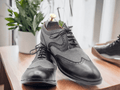 Expertly crafted from high-quality leather, these Men Grey Black Oxfords Wing Tip Leather Shoes are the perfect addition to any man's wardrobe. With its sleek design and classic wing tip style, these shoes are versatile enough for both formal and casual occasions. Elevate your style with these timeless Men Dress Shoes.