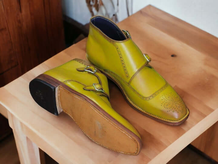 These Yellow Buckle Boots are hand crafted with the highest quality bespoke leather, creating a boot that offers maximum durability and comfort. The unique yellow buckle accent adds a stylish detail to any outfit. Enjoy a classic look that will last for years to come.