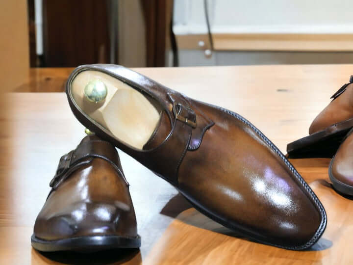 These handmade brown monk leather shoes are crafted from the finest quality leather for a sophisticated and timeless look. Stitched and seamed with precision, the leather upper is designed for lasting comfort and style. Perfect for any occasion, these shoes provide an undeniably polished look.