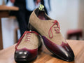 Expertly crafted and uniquely designed, our Men's Two Tone Wing Tip Shoes are the perfect blend of style and quality. The handmade burgundy and beige leather suede adds a touch of sophistication, while the wing tip design offers a classic and timeless look. Elevate your shoe game with these must-have shoes.