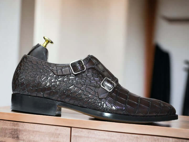 These handmade men's Brown Monk Alligator Shoes provide an elegant and timeless design. Crafted from high-quality alligator leather, and expertly stitched with durable thread, these shoes are perfect for looking sharp and stylish, while providing long-lasting comfort.