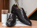 These handmade men's Brown Monk Alligator Shoes provide an elegant and timeless design. Crafted from high-quality alligator leather, and expertly stitched with durable thread, these shoes are perfect for looking sharp and stylish, while providing long-lasting comfort.