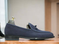 These men's navy blue leather suede loafers are the perfect addition to any man's shoe collection. With a slip-on design, they provide easy and comfortable wear for any casual occasion. The high-quality materials and stylish design make these shoes a must-have for any fashion-forward man.