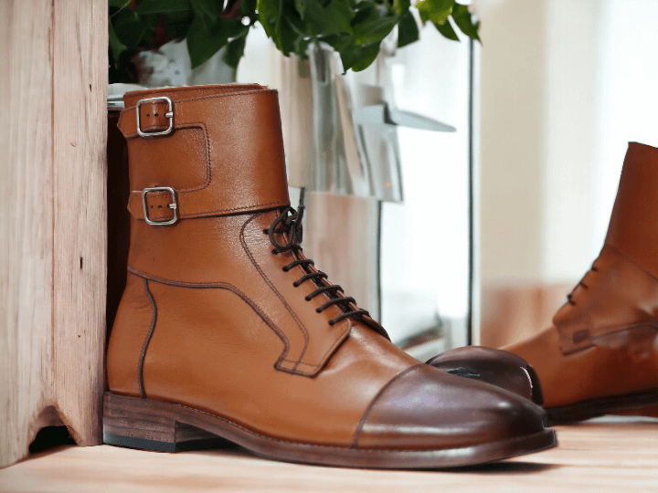 Expertly handcrafted from genuine brown leather, these men's desert boots are the perfect combination of style and functionality. With a sleek buckle design and ankle height, they add a touch of sophistication to any outfit. Stay comfortable and on-trend with these stylish boots for men.