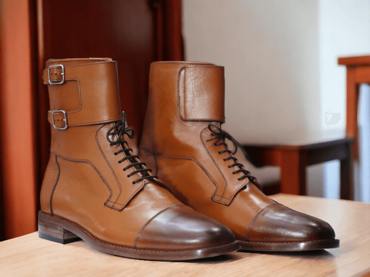 Expertly handcrafted from genuine brown leather, these men's desert boots are the perfect combination of style and functionality. With a sleek buckle design and ankle height, they add a touch of sophistication to any outfit. Stay comfortable and on-trend with these stylish boots for men.