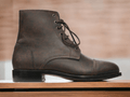 Experience the timeless elegance of our Bespoke Brown Vintage Look Boots. Crafted with quality leather, these ankle high designer boots offer both style and durability. Perfect for any occasion, elevate your wardrobe with this essential addition.