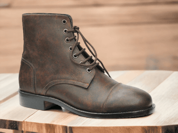 Experience the timeless elegance of our Bespoke Brown Vintage Look Boots. Crafted with quality leather, these ankle high designer boots offer both style and durability. Perfect for any occasion, elevate your wardrobe with this essential addition.