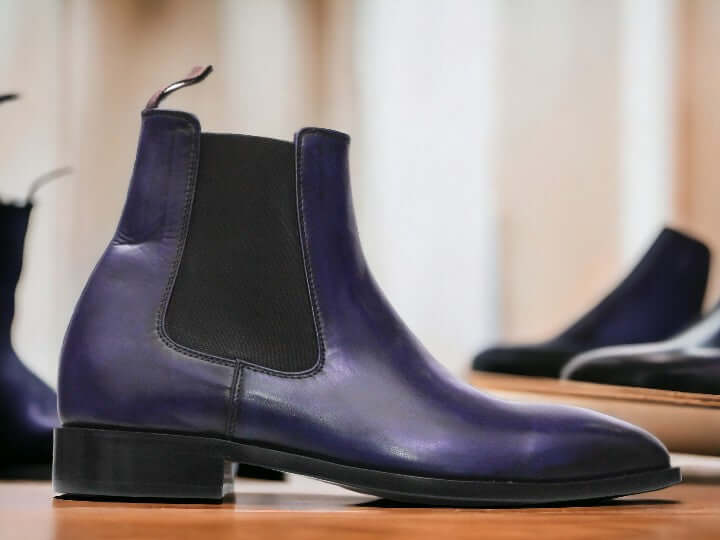 Expertly crafted by hand, these Navy Blue Chelsea Leather Boots are the perfect blend of style and comfort. Slip them on effortlessly and enjoy the durability and sleek design of these ankle boots. Elevate your wardrobe with these high-quality, handmade boots.