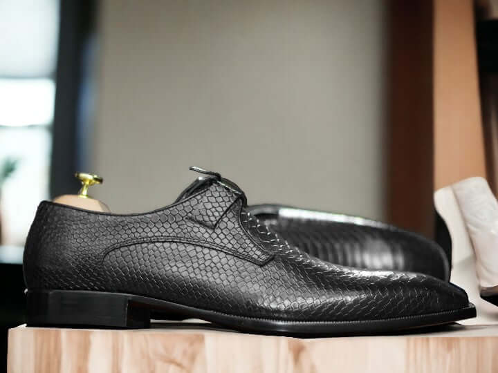 Expertly crafted, these Men's Blue Python Loafer Shoes are handmade with genuine leather and feature a stylish lace-up design. Embrace luxury and unique style with these designer moccasins. Comfort and sophistication at their finest.