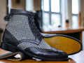 These stylish designer boots provide the perfect blend of classic and modern. Made of black leather and tweed, these ankle-high boots are designed to be comfortable and fashionable. A must-have for the modern man.