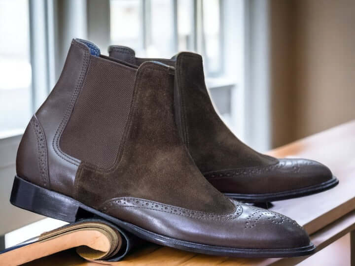 These Men Brown Chelsea Boots are a stylish combination of luxury, fashion and function. Crafted from premium brown suede, this ankle-high boot features a hand-painted finish for a sophisticated look. Perfect for formal and casual occasions.