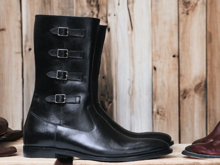 Expertly crafted by hand, these Men's Black Leather Boots offer a timeless and stylish addition to your wardrobe. Featuring a buckle closure and long leather design, these boots provide durability and sophistication. Perfect for any occasion, these boots will elevate any outfit.