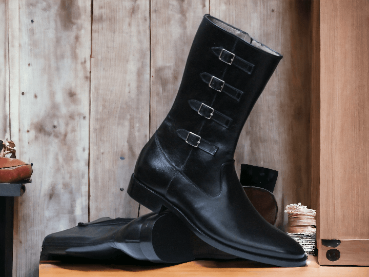 Expertly crafted by hand, these Men's Black Leather Boots offer a timeless and stylish addition to your wardrobe. Featuring a buckle closure and long leather design, these boots provide durability and sophistication. Perfect for any occasion, these boots will elevate any outfit.