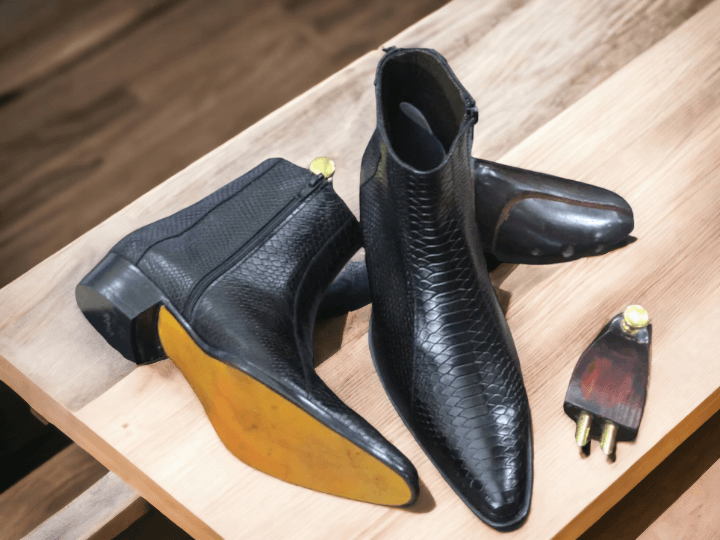 Our Bespoke Handmade Black Colour Genuine Leather Boots,Python Texture Leather Boots are crafted from full-grain leather with a python-embossed texture, ensuring long-lasting quality and style. Our expert craftsmanship ensures enduring comfort and unparalleled durability.&nbsp;