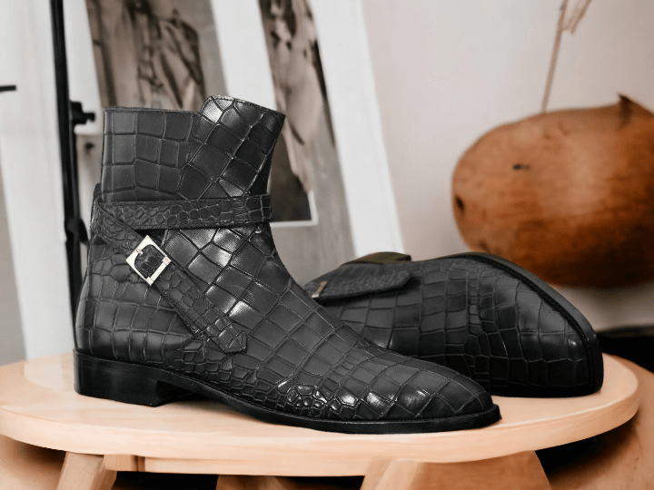 Introducing our Men's Alligator Jodhpurs Boot, featuring a unique handmade alligator print and hand painted leather. Expertly crafted for a sophisticated and stylish look, these boots combine luxury and durability. Elevate your footwear game with these versatile and eye-catching boots.