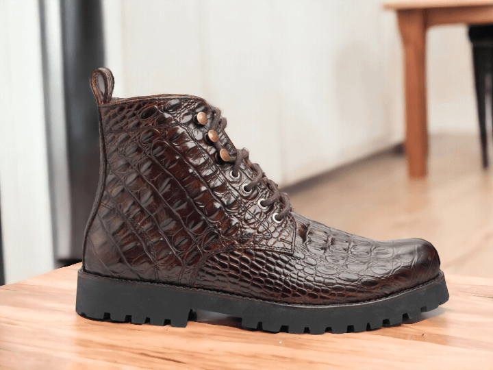 Introducing our Handmade Brown Crocodile Boots for the discerning gentleman. Made from high-quality leather and delicately crafted by skilled artisans, these designer boots are the epitome of luxury and style. Stand out from the crowd with these unique and exquisite boots.