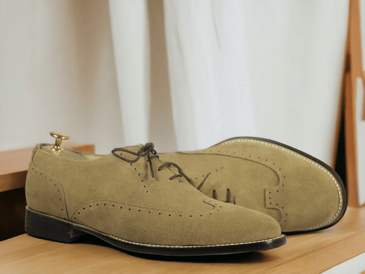 Expertly crafted for the modern man, these New Handmade Men's Beige Wing Tip Suede Shoes are the perfect addition to your shoe collection. The wing tip design adds a touch of sophistication, while the lace up feature ensures a secure and comfortable fit. Elevate your style with these designer shoes.