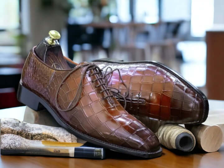 These alligator leather shoes are handmade for a comfortable and stylish fit. The lace-up design and classic style ensure you look great no matter the occasion. The brown leather finish gives a timeless look you won't find anywhere else.