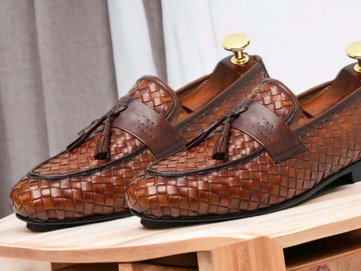 Discover the perfect blend of style and craftsmanship with our Handmade Men's Woven Leather Loafers. These unique slip-ons feature a stylish woven design in luxurious brown leather. Step up your shoe game with this one-of-a-kind footwear for men. Expertly handmade for true quality and sophistication.