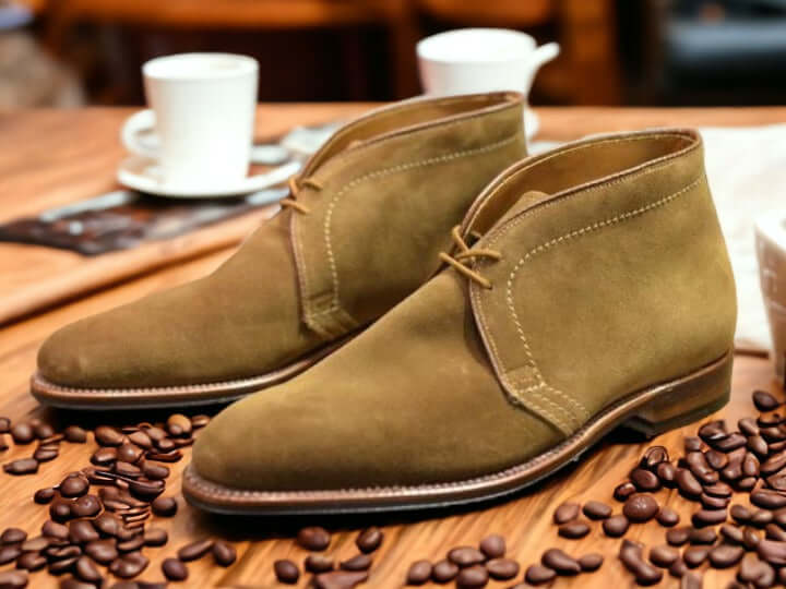 Crafted with premium suede leather, these bespoke chukka lace-up boots offer a sophisticated look. Featuring a luxurious leather sole and durable quality, these boots provide ultimate comfort and long-lasting style.