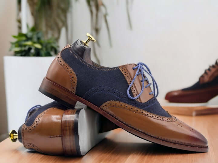 These Men's Handmade Blue Brown Lace Up Office Shoes offer a stylish and comfortable option for professional attire. The handmade construction guarantees quality and durability, while the lace-up design provides a secure fit. Perfect for any office setting, these shoes offer both style and function for the modern man.