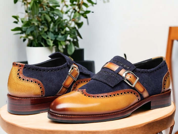 Expertly crafted with hand-painted detailing, these Men's Blue Brown Buckle Leather Shoes exude style and sophistication. The contrasting blue and brown colors add a touch of elegance to any formal outfit. The buckle closure ensures a secure fit, while the high-quality leather provides comfort and durability. Elevate your wardrobe with these stunning formal shoes.