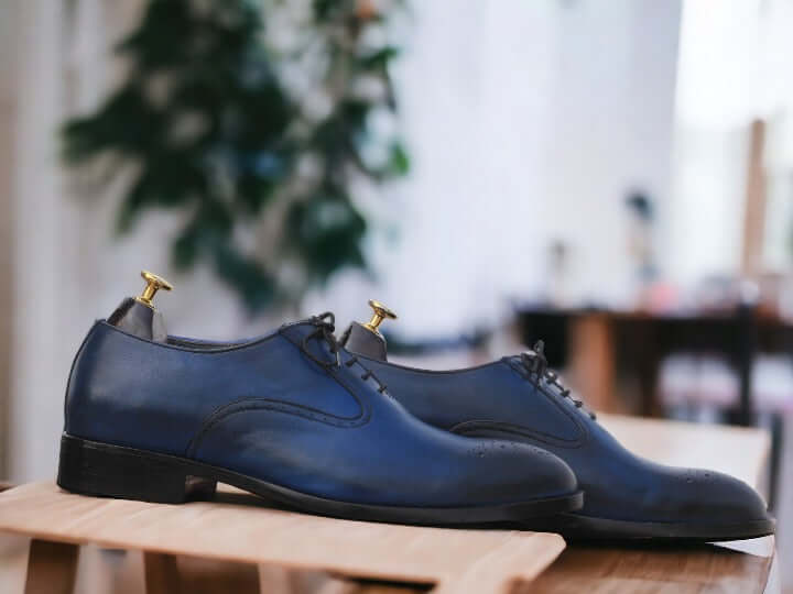 Expertly handcrafted with premium materials, our Two Tone Blue Shoes for men exude timeless style and superior quality. The unique two-tone design effortlessly elevates any outfit, while the durable construction ensures long-lasting comfort. Step into luxury and sophistication with these handmade shoes