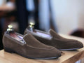 Expertly hand-painted, these men's brown suede loafer shoes offer a sophisticated and stylish look. Designed with a slip-on style, they provide effortless comfort and convenience. Elevate your footwear collection with these timeless and versatile moccasin shoes.