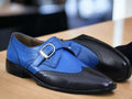 Expertly crafted by hand, these Men's Blue Monk Dress Leather Buckle Shoes are the epitome of luxury and style. Made with the finest quality leather, these shoes offer comfort, durability, and a classic look. The unique monk strap design adds a touch of sophistication, making them the perfect choice for any formal occasion.