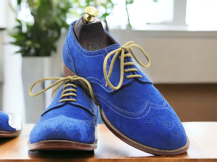 Expertly hand painted and crafted with premium blue suede, these men's lace up office shoes exude sophistication and style. Perfect for the office or a night out, these shoes offer both comfort and a unique touch to any outfit. Elevate your wardrobe with these one-of-a-kind shoes.