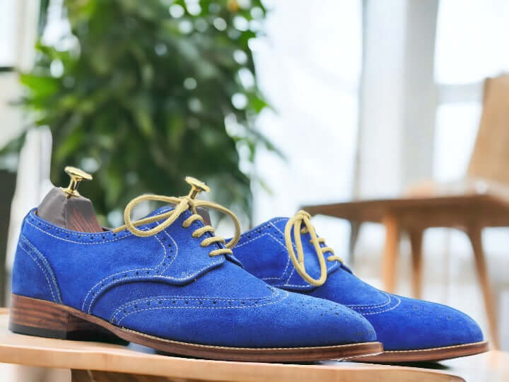 Expertly hand painted and crafted with premium blue suede, these men's lace up office shoes exude sophistication and style. Perfect for the office or a night out, these shoes offer both comfort and a unique touch to any outfit. Elevate your wardrobe with these one-of-a-kind shoes.