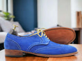 Expertly hand painted and crafted with premium blue suede, these men's lace up office shoes exude sophistication and style. Perfect for the office or a night out, these shoes offer both comfort and a unique touch to any outfit. Elevate your wardrobe with these one-of-a-kind shoes.