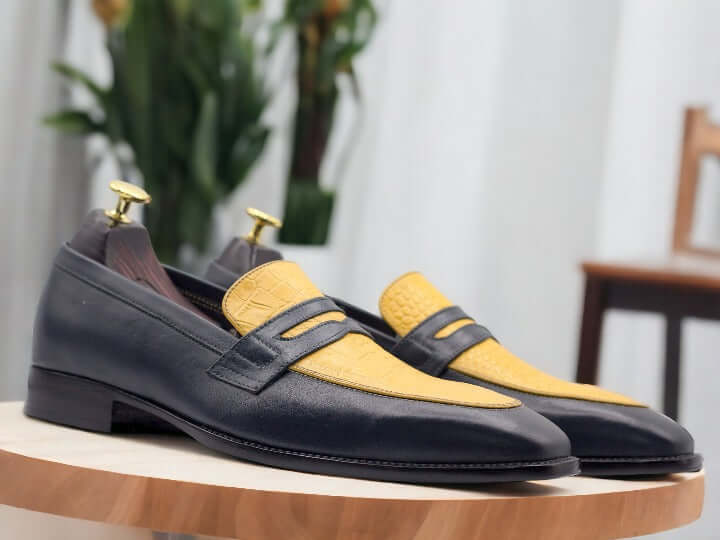 These Handmade Two Tone Penny Loafer Leather Shoes are the perfect blend of style and comfort. Crafted with durable leather, these moccasin slip-ons will elevate any outfit while providing long-lasting wear. Expertly handmade with intricate details, these shoes are a must-have for any fashion-forward individual.