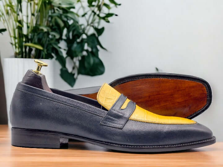 These Handmade Two Tone Penny Loafer Leather Shoes are the perfect blend of style and comfort. Crafted with durable leather, these moccasin slip-ons will elevate any outfit while providing long-lasting wear. Expertly handmade with intricate details, these shoes are a must-have for any fashion-forward individual.