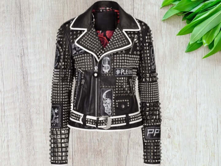 The Men Silver Studded Jacket Black Silver Spiked Leather Belted Biker Jacket is a stylish and edgy addition to any wardrobe. Made with genuine leather and adorned with silver studs and spikes, this jacket is a must-have for any biker or fashion enthusiast. The belted waist adds a touch of customization, making it a perfect fit for any body type.