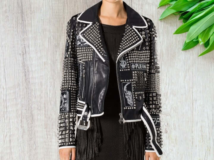 The Men Silver Studded Jacket Black Silver Spiked Leather Belted Biker Jacket is a stylish and edgy addition to any wardrobe. Made with genuine leather and adorned with silver studs and spikes, this jacket is a must-have for any biker or fashion enthusiast. The belted waist adds a touch of customization, making it a perfect fit for any body type.