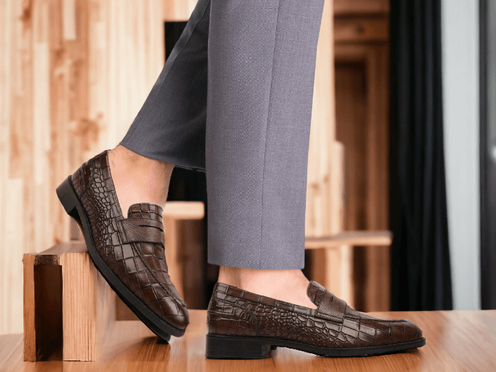 Expertly crafted from luxurious alligator leather, these Men Brown Loafer Penny Shoes exude sophistication and style. Each pair is meticulously handmade for a perfect fit and superior comfort. Elevate your wardrobe with these timeless and elegant loafers.