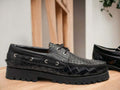 Expertly crafted with a sleek alligator print, these handmade black loafer shoes are sure to elevate any outfit. The chunky sole provides added comfort and style, while the slip on design makes them a convenient and versatile choice. Perfect for any occasion, these shoes are a must-have for any fashion-forward individual.