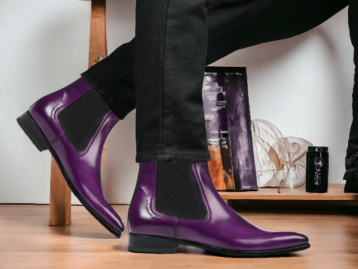 Expertly handcrafted, these Purple Chelsea Boots are the perfect combination of style and durability. Made with high-quality leather, these ankle-high boots are perfect for any party, providing both comfort and fashion. Elevate your wardrobe with these chic and versatile boots.