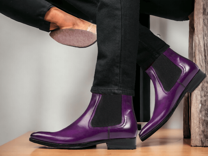 Expertly handcrafted, these Purple Chelsea Boots are the perfect combination of style and durability. Made with high-quality leather, these ankle-high boots are perfect for any party, providing both comfort and fashion. Elevate your wardrobe with these chic and versatile boots.